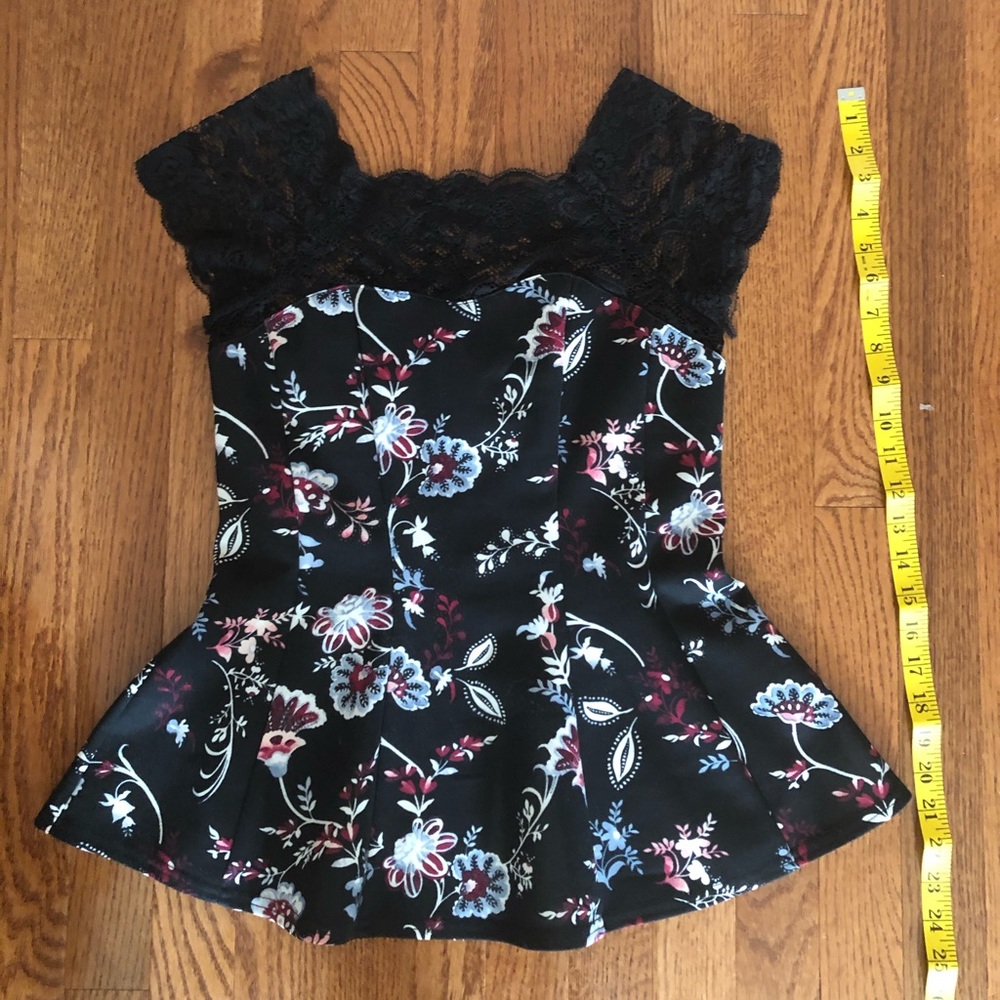 Stretchy Peplum top with lace on upper chest